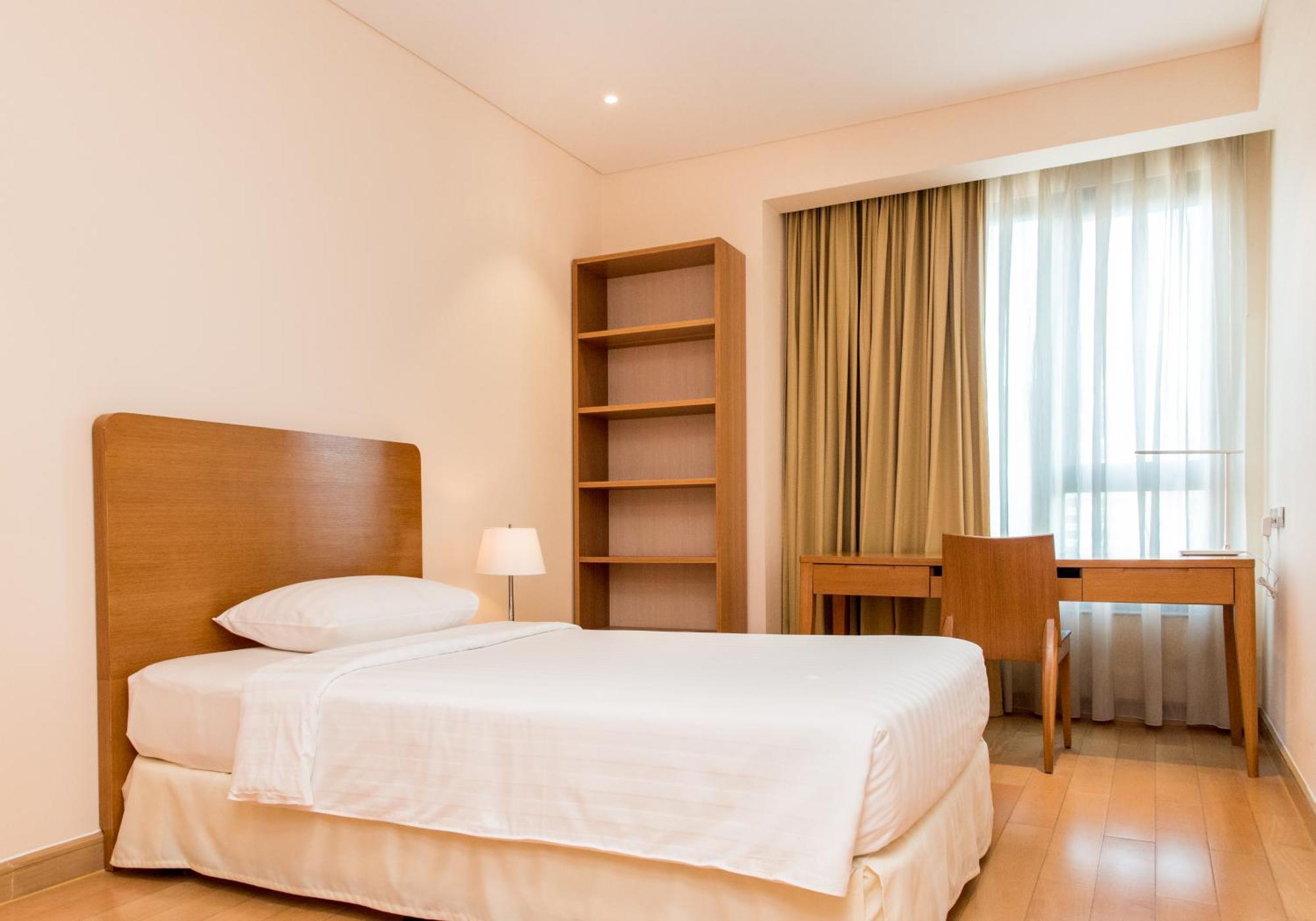 โรงแรมเชอร์วูดเรสซิเดนซ์ โฮจิมินห์ซิตี้ ภายนอก รูปภาพ A single room at the residence halls
