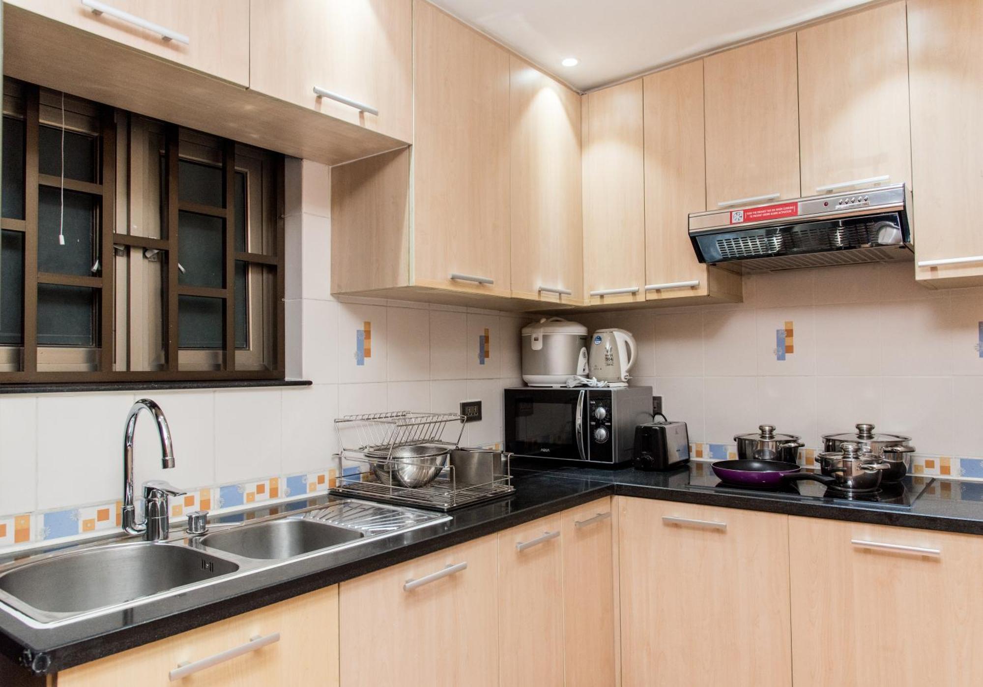 โรงแรมเชอร์วูดเรสซิเดนซ์ โฮจิมินห์ซิตี้ ภายนอก รูปภาพ A modern Japanese kitchen