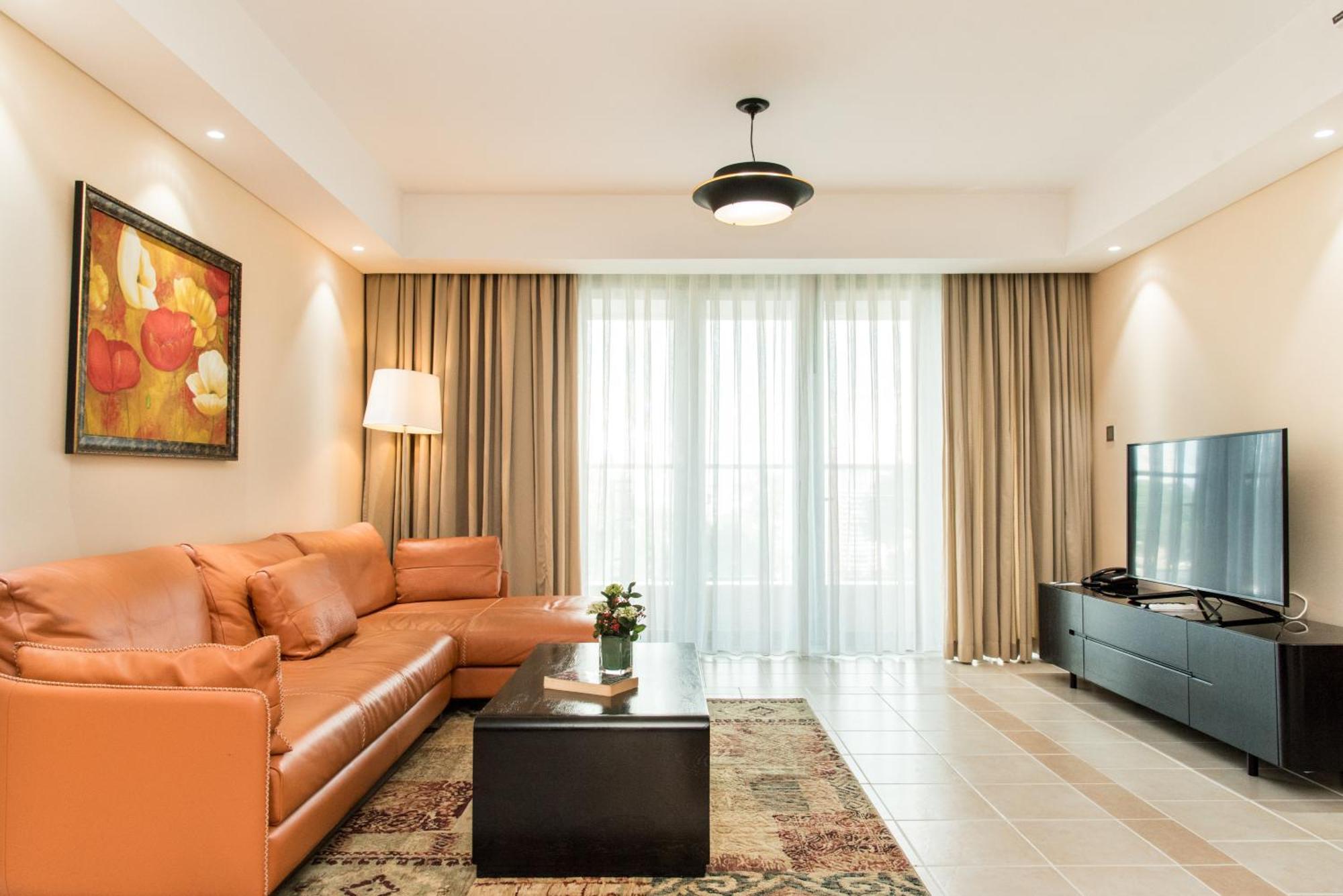 โรงแรมเชอร์วูดเรสซิเดนซ์ โฮจิมินห์ซิตี้ ภายนอก รูปภาพ A living room in a hotel