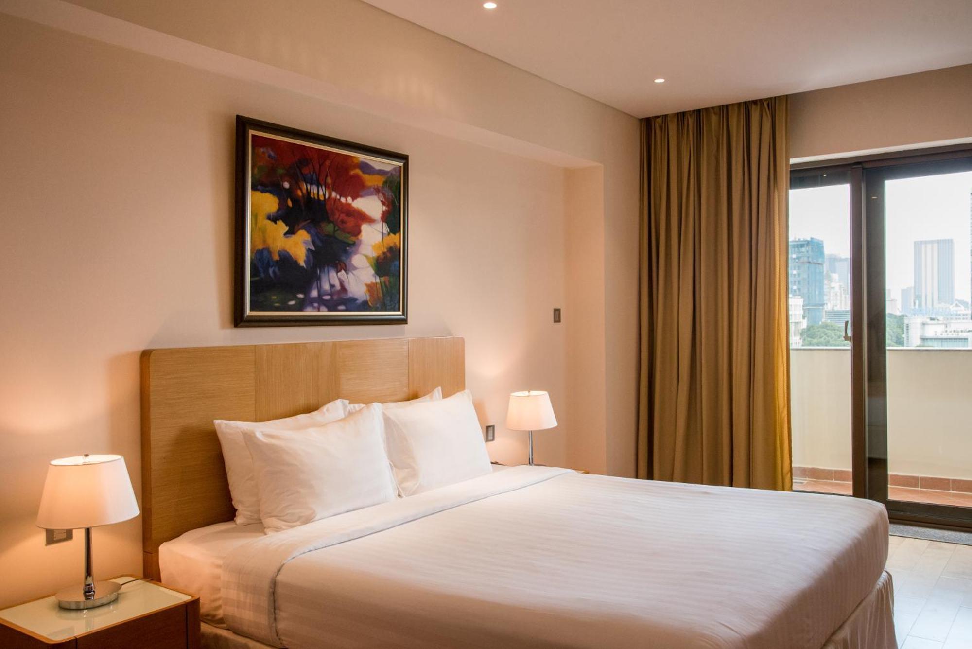 โรงแรมเชอร์วูดเรสซิเดนซ์ โฮจิมินห์ซิตี้ ภายนอก รูปภาพ A bedroom at the hotel