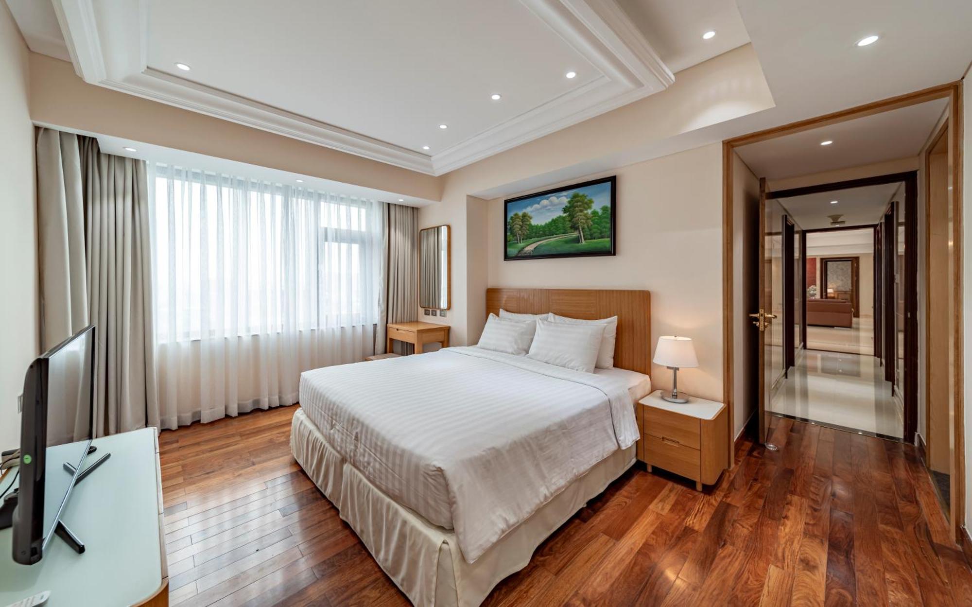 โรงแรมเชอร์วูดเรสซิเดนซ์ โฮจิมินห์ซิตี้ ภายนอก รูปภาพ A bedroom at the hotel