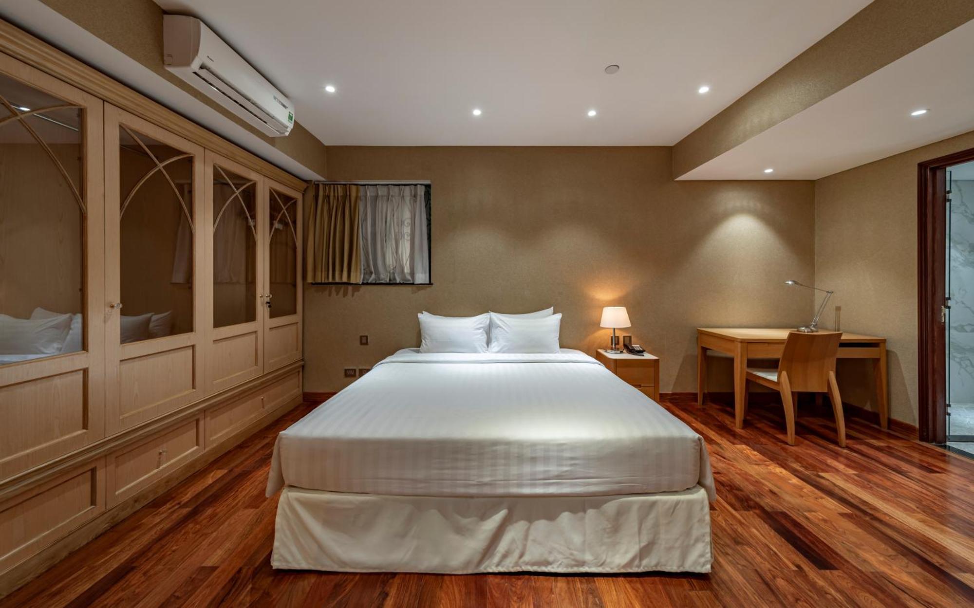 โรงแรมเชอร์วูดเรสซิเดนซ์ โฮจิมินห์ซิตี้ ภายนอก รูปภาพ A bedroom at the hotel